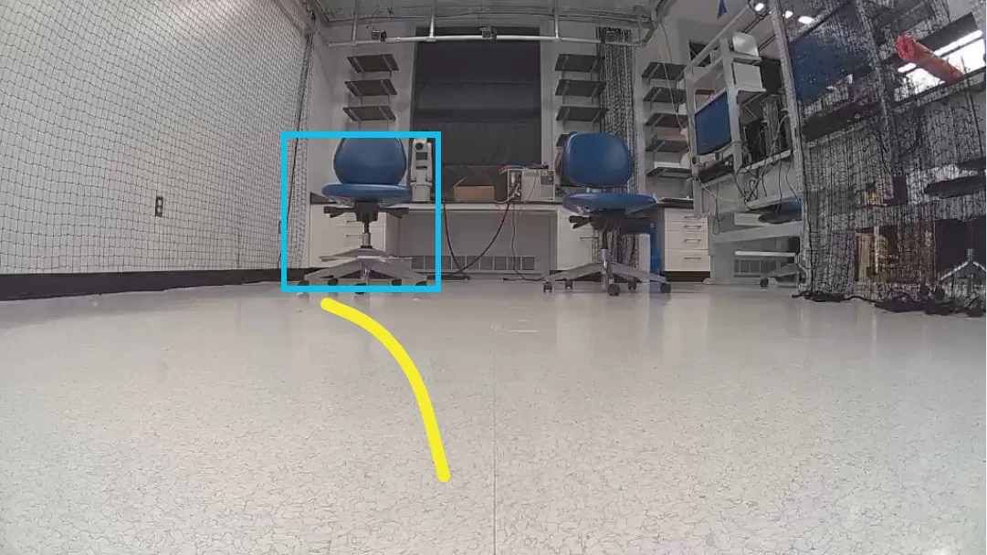 Robot camera view of blue office chairs along a lab workbench; the leftmost chair is boxed and the predicted path curves left toward it.